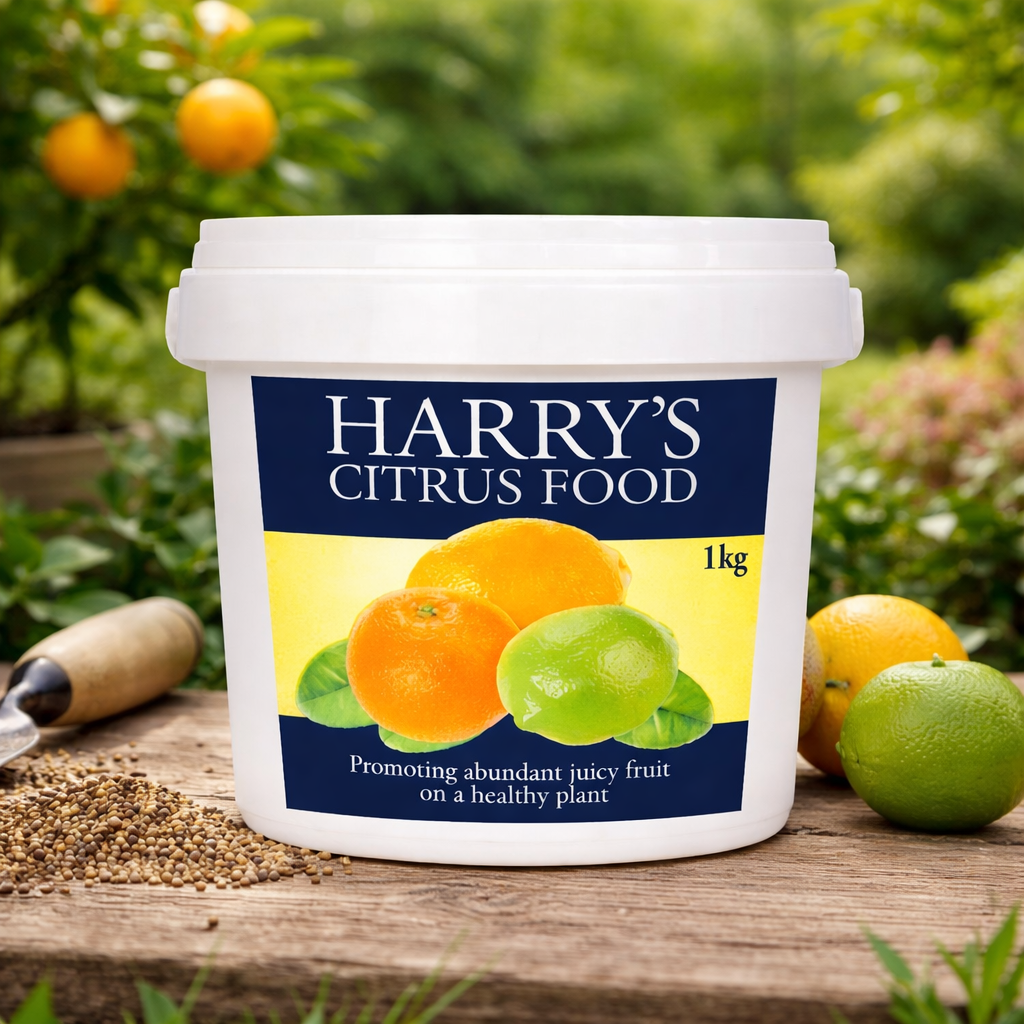 Container of 'Harry's Citrus Food' with citrus fruits on a garden background