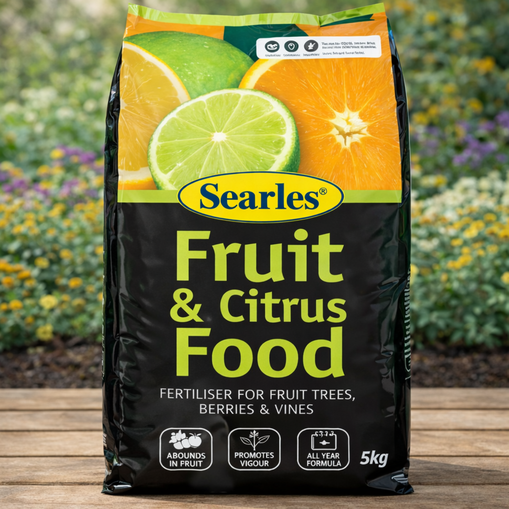 Bag of Searles Fruit & Citrus Food with fruit illustrations on a blurred garden background
